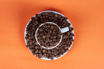 Obraz na płótnie Canvas Coffee bean and coffee mug
