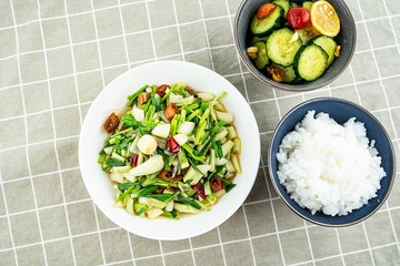 Chinese cuisine salad with cucumber slices and pickled peppers