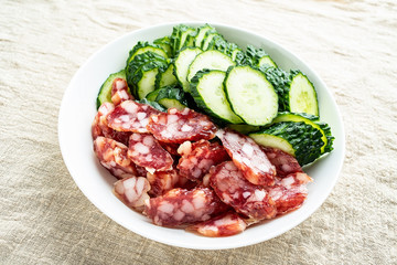 Chopped cucumber slices and sausage