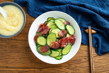 Cucumber fried sausage and millet porridge
