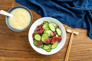 Cucumber fried sausage and millet porridge