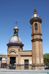 Fototapeta na wymiar Chapel del Carmen at the Triana Bridge in Seville
