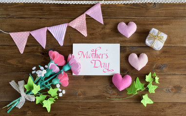 Mothers day with handwritten calligraphy and handmade flowers, hearts, flags, a gift. (25-1)