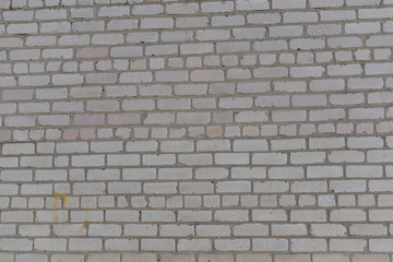 Old brick wall with cracks and scratches , background, texture	