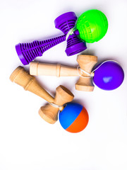 colorful Kendama japanese toys, isolated on white, competition concept