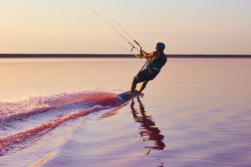 Kitesurfer on the pink lake