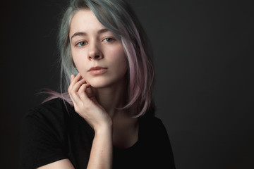 Portrait of the attractive girl with dyed hair.