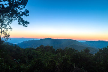 Fototapeta premium Beautiful landscape of mountain and forest with twilight sky.