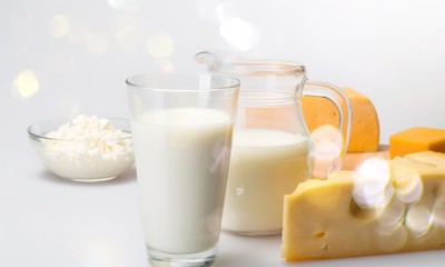 Dairy Products- Cheeses and Milk on the Grey Background