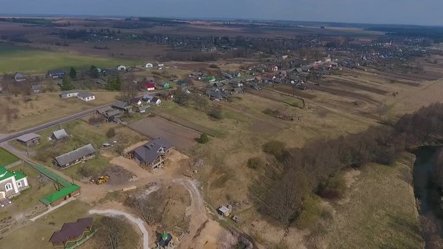 Village houses in the spring, Vishnevo Belarus. Shot by drone