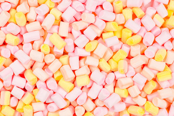 Marshmallow. Background of pink and yellow colorful mini marshmallows.