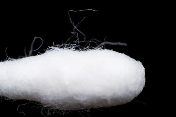 cotton bud close-up and black background