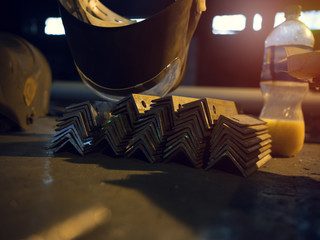 Rows of little metal plate mounts on floor