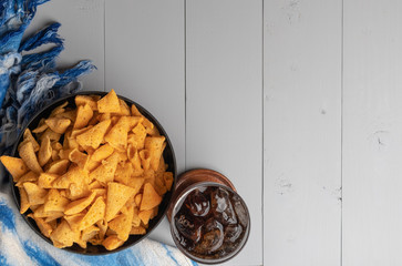 Fototapeta na wymiar crunchy corn cones snack on wooden bowl