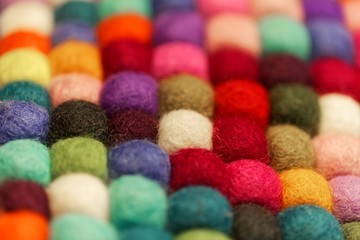 Different colored balls of wool