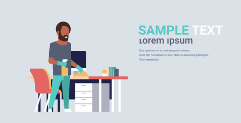 man cleaning computer table with duster african american guy wiping workplace desk housework concept male cartoon character full length flat horizontal copy space