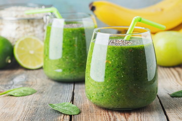 Green fresh healthy smoothie with fruits and vegetables
