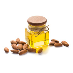 Bottle of almond oil on white