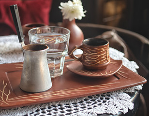 Traditional turkish coffe served on the table.