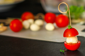 tomato and Mozzarella canapes, salad - caprese. food background. top image
