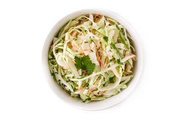 Coleslaw salad in white bowl isolated on white background. Top view - obrazy, fototapety, plakaty