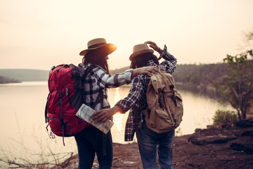 Hipster couple women travelling in the national park together