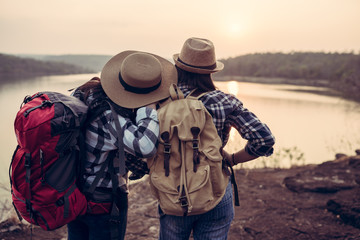 Young hipster women couple travelling in the national park in holiday of them