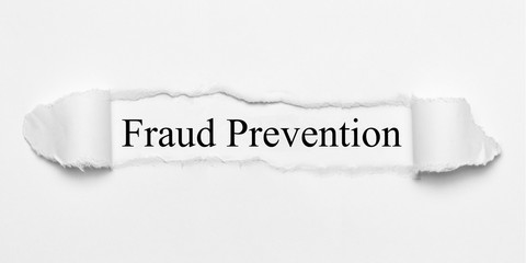 Obraz premium Fraud Prevention on white torn paper