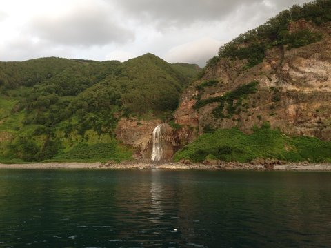 Seaside Mountains and Waterfall in Shiretoko, Hokkaido, Japan