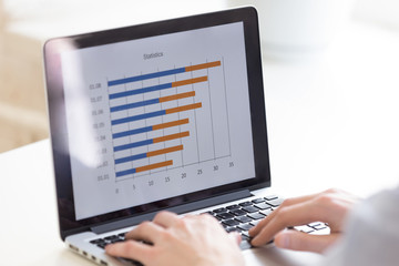 Graph Bar Chart Diagram Statistics Graphic at laptop