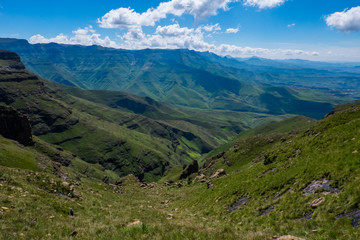 Fototapeta na wymiar Landscape view over green mountains with clouds, South Africa, Africa