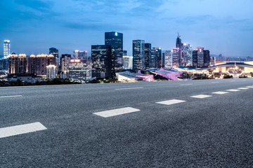 Road and skyline of urban architecture..