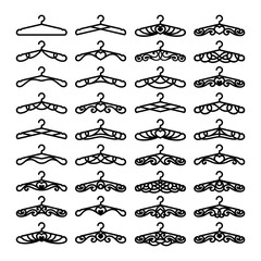Set of decorative clothes hangers for atelier, wedding salon, boutique, store. Black objects on white background. Template for laser cutting, wood carving, paper cut and printing. Vector illustration.
