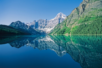Fototapeta na wymiar Howse Peak reflected in Chephren Lake, Banff National Park, Canada