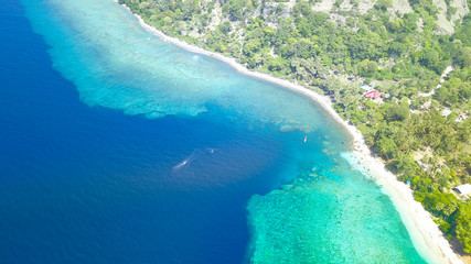 Naklejka na ściany i meble Beautiful nature of blue sea sand and Turquoise color water waves at Atauro Island, Timor Leste