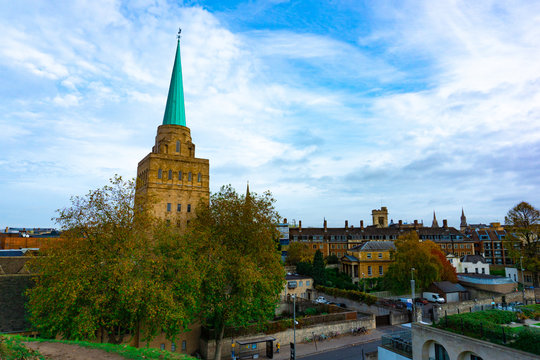 Aerial view of Oxford with the Spire of Nuffield College in cloudy blue sky day