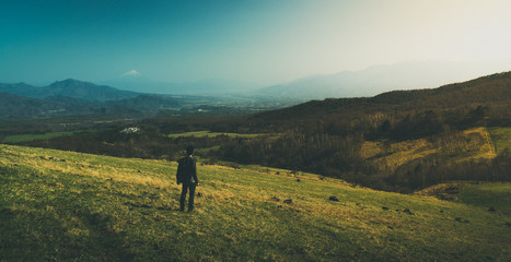 Obraz premium man on top of hill