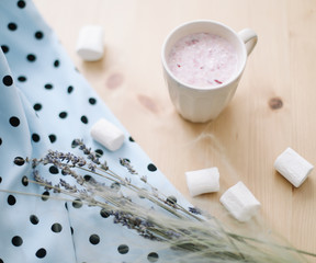 Fototapeta premium Fresh strawberry smoothie or milkshake with marshmallows. Creative summer flatlay, top view