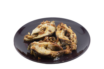 Fried fish isolated on white background.Clipping path.