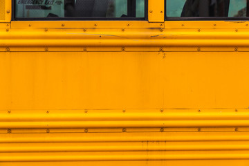 Old yellow school bus in New York City, USA