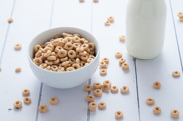 breakfast cereal in a bowl on a white wooden table