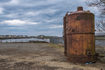 Obraz premium Irvine Harbour in Ayrshire Scotland looking Over some Old Rusting Maratime Equiptment