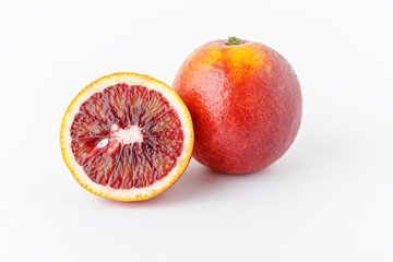 Isolated oranges. Fresh ripe red oranges on white background. Healthy orange fruits background.