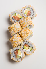 Fresh salmon and avocado sushi uramaki