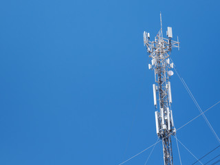 Wireless tower on blue sky background