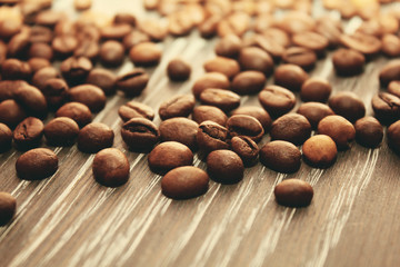 coffee beans on wooden background. view from above.