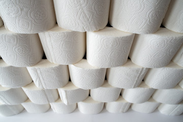 rhythmic pyramid of toilet paper rolls