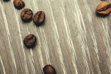 coffee beans on wooden background. view from above.