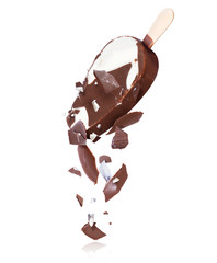 Pieces of chocolate ice cream are falling down, isolated on white background
