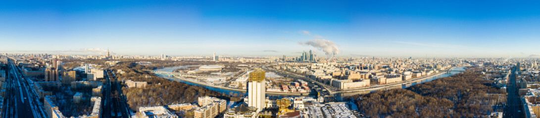 Fototapeta premium Moscow panorama and Leninsky Avenue with Monument to Yuri Gagarin on a winter day. top view of the avenue and car traffic.